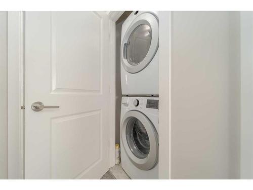 3-57 Aquitania Circle West, Lethbridge, AB - Indoor Photo Showing Laundry Room