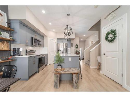 3-57 Aquitania Circle West, Lethbridge, AB - Indoor Photo Showing Kitchen With Upgraded Kitchen