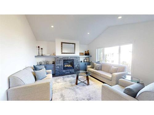 697 Sixmile Crescent South, Lethbridge, AB - Indoor Photo Showing Living Room With Fireplace