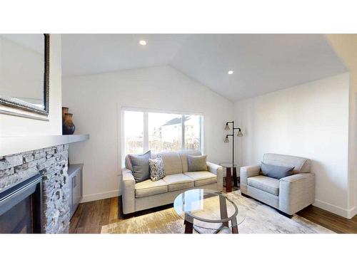 697 Sixmile Crescent South, Lethbridge, AB - Indoor Photo Showing Living Room With Fireplace