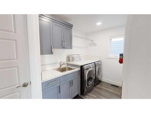 697 Sixmile Crescent South, Lethbridge, AB - Indoor Photo Showing Laundry Room