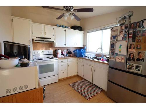 2313 22 Ave, Coaldale, AB - Indoor Photo Showing Kitchen With Double Sink