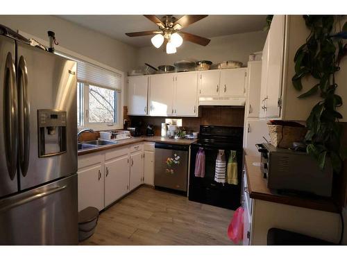 2311 22 Ave, Coaldale, AB - Indoor Photo Showing Kitchen With Double Sink