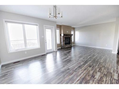 493 Devonia Way West, Lethbridge, AB - Indoor Photo Showing Living Room With Fireplace