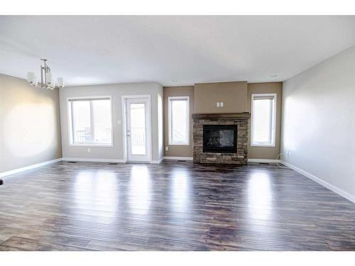 493 Devonia Way West, Lethbridge, AB - Indoor Photo Showing Living Room With Fireplace