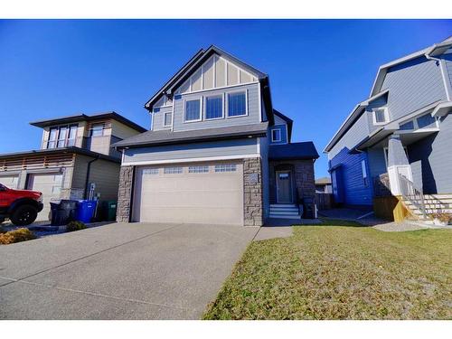 493 Devonia Way West, Lethbridge, AB - Outdoor With Facade