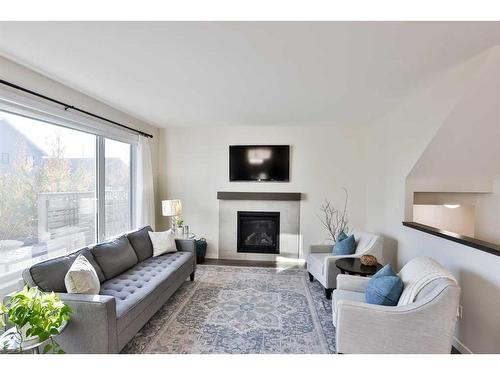 91 Riverford Close West, Lethbridge, AB - Indoor Photo Showing Living Room With Fireplace