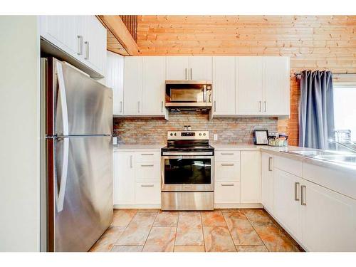 305 1St Avenue, Beaver Mines, AB - Indoor Photo Showing Kitchen With Double Sink With Upgraded Kitchen