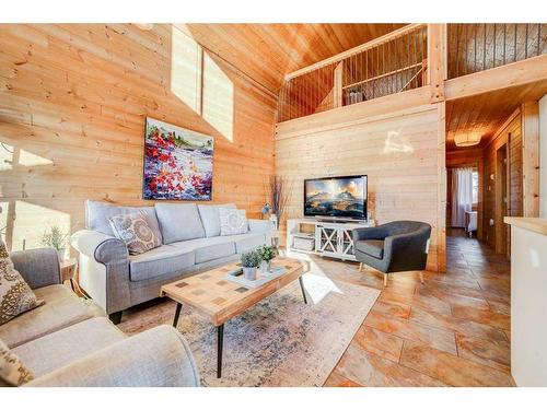 305 1St Avenue, Beaver Mines, AB - Indoor Photo Showing Living Room With Fireplace