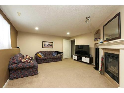 203 Grand River Boulevard West, Lethbridge, AB - Indoor With Fireplace