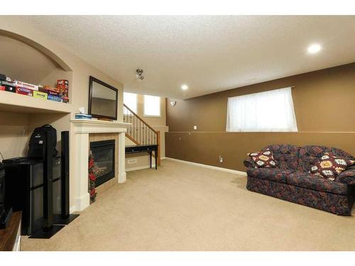 203 Grand River Boulevard West, Lethbridge, AB - Indoor With Fireplace