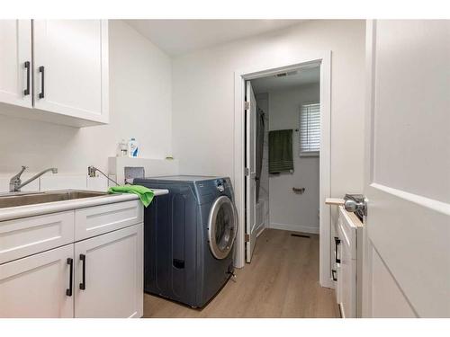 31033 Range Road 262, Cardston, AB - Indoor Photo Showing Laundry Room