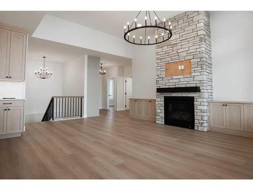 2154 21A Street, Coaldale, AB - Indoor Photo Showing Living Room With Fireplace