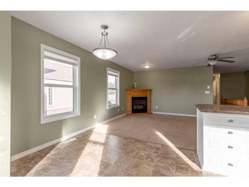 359 3 Avenue West, Cardston, AB - Indoor With Fireplace