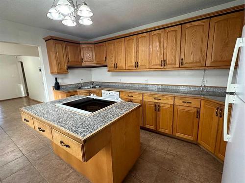 6017 56 Street, Taber, AB - Indoor Photo Showing Kitchen With Double Sink