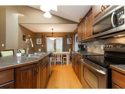 199 Riverstone Boulevard West, Lethbridge, AB - Indoor Photo Showing Kitchen With Double Sink