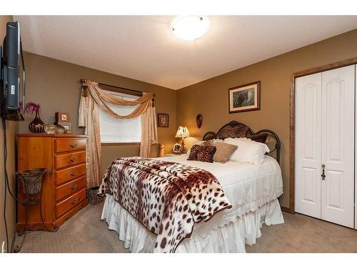 199 Riverstone Boulevard West, Lethbridge, AB - Indoor Photo Showing Bedroom