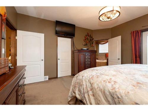 199 Riverstone Boulevard West, Lethbridge, AB - Indoor Photo Showing Bedroom