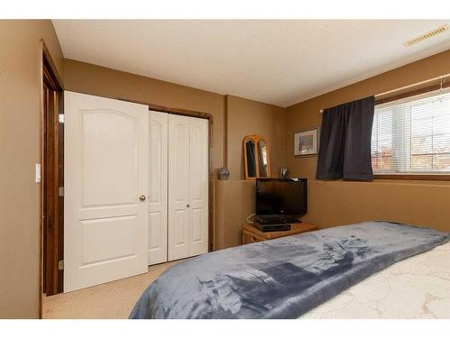 199 Riverstone Boulevard West, Lethbridge, AB - Indoor Photo Showing Bedroom