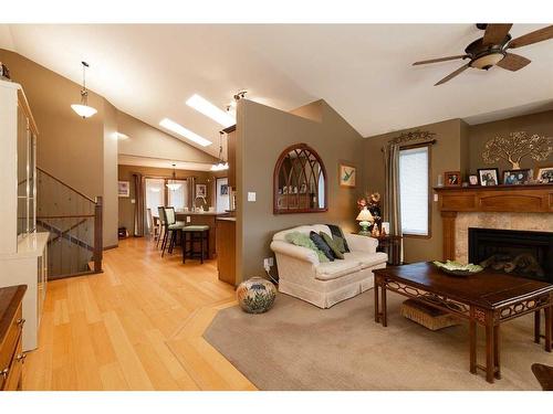 199 Riverstone Boulevard West, Lethbridge, AB - Indoor Photo Showing Living Room With Fireplace