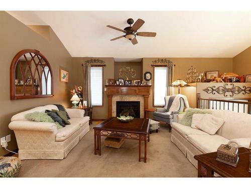 199 Riverstone Boulevard West, Lethbridge, AB - Indoor Photo Showing Living Room With Fireplace