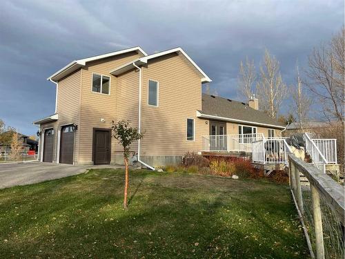 214 Falcon Ridge Way, Rural Lethbridge County, AB - Outdoor With Deck Patio Veranda