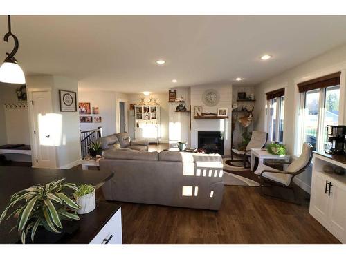 505 12 Ave, Barnwell, AB - Indoor Photo Showing Living Room With Fireplace