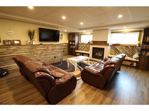 505 12 Ave, Barnwell, AB - Indoor With Fireplace