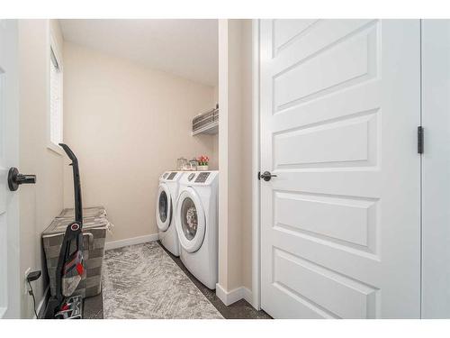 665 Aquitania Boulevard West, Lethbridge, AB - Indoor Photo Showing Laundry Room