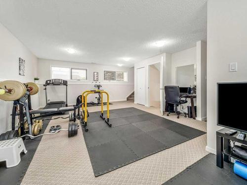 88 Erminedale Boulevard North, Lethbridge, AB - Indoor Photo Showing Gym Room