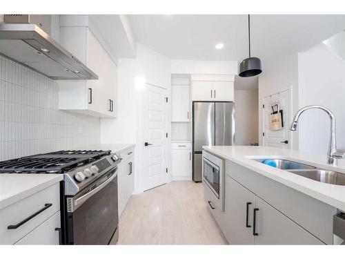 4326 28 Avenue South, Lethbridge, AB - Indoor Photo Showing Kitchen With Double Sink With Upgraded Kitchen