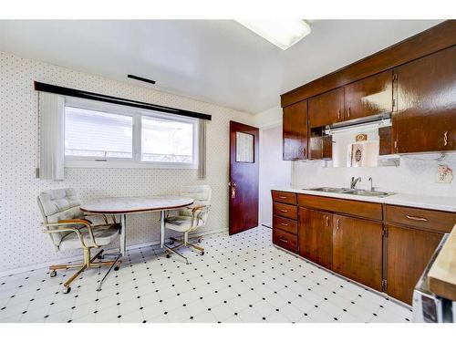 929 Maple Street, Pincher Creek, AB - Indoor Photo Showing Kitchen With Double Sink