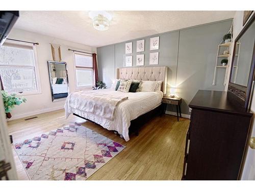 192W 100 N Avenue, Raymond, AB - Indoor Photo Showing Bedroom