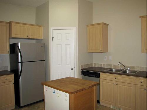 5111 54 Street, Taber, AB - Indoor Photo Showing Kitchen With Double Sink