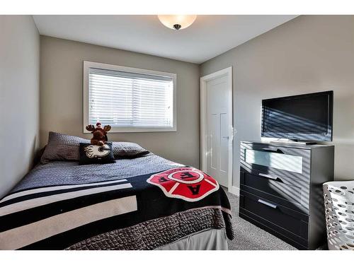 115 Moonlight Boulevard West, Lethbridge, AB - Indoor Photo Showing Bedroom