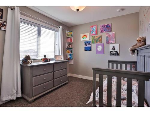 115 Moonlight Boulevard West, Lethbridge, AB - Indoor Photo Showing Bedroom