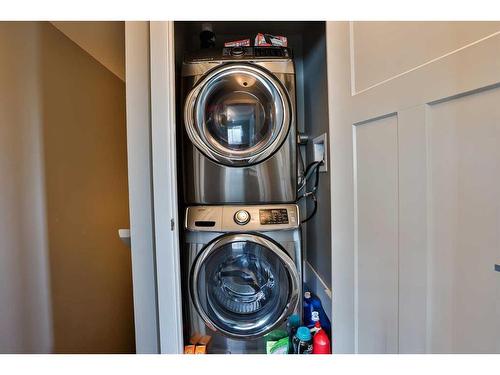 115 Moonlight Boulevard West, Lethbridge, AB - Indoor Photo Showing Laundry Room