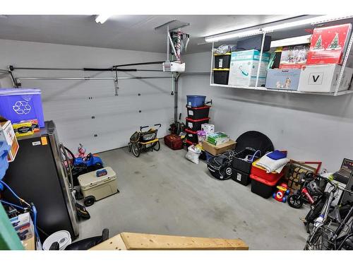 115 Moonlight Boulevard West, Lethbridge, AB - Indoor Photo Showing Garage