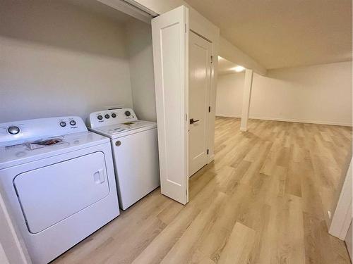 150 Oxford Road West, Lethbridge, AB - Indoor Photo Showing Laundry Room