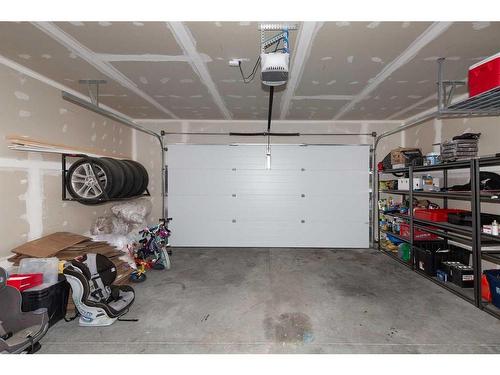 44 Alma Isobell Hodder Crescent North, Lethbridge, AB - Indoor Photo Showing Garage