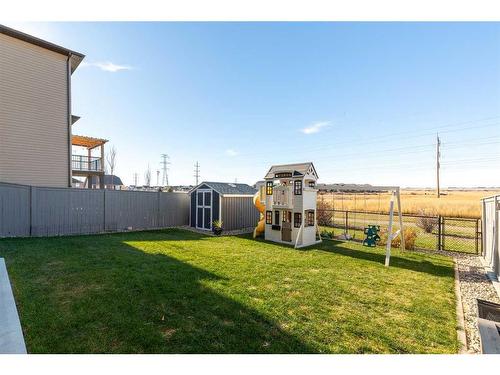 44 Alma Isobell Hodder Crescent North, Lethbridge, AB - Outdoor With Backyard