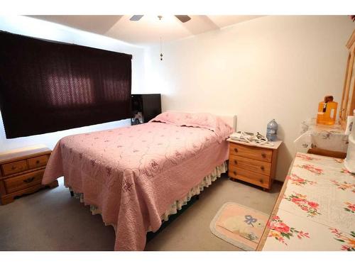 6008 53 St, Taber, AB - Indoor Photo Showing Bedroom