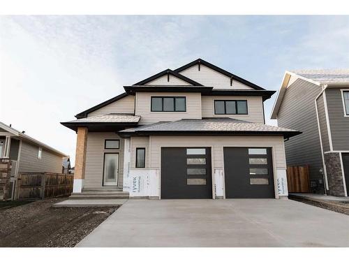 2117 Cedar Crescent, Coaldale, AB - Outdoor With Facade