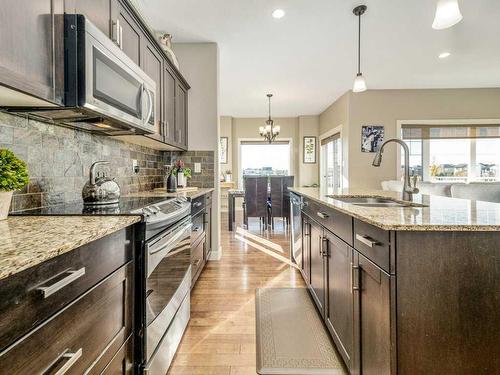 92 Firelight Way West, Lethbridge, AB - Indoor Photo Showing Kitchen With Double Sink With Upgraded Kitchen