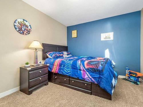 92 Firelight Way West, Lethbridge, AB - Indoor Photo Showing Bedroom