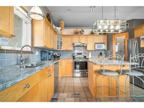 51 Sunrise Circle Sw, Medicine Hat, AB - Indoor Photo Showing Kitchen With Stainless Steel Kitchen With Double Sink