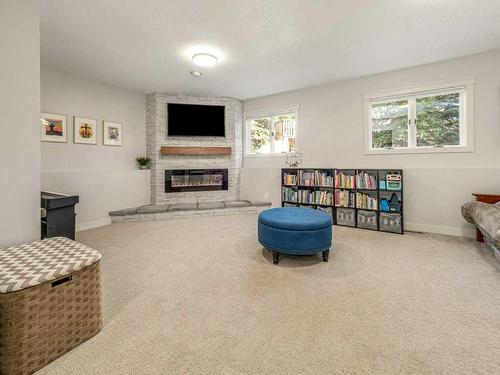 87 Tudor Crescent South, Lethbridge, AB - Indoor Photo Showing Other Room With Fireplace