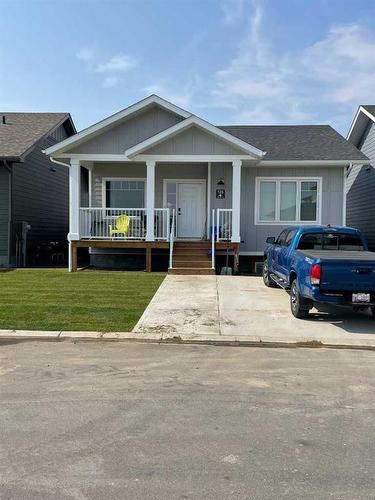 126 Prairie Gold Street, Taber, AB - Outdoor With Deck Patio Veranda With Facade