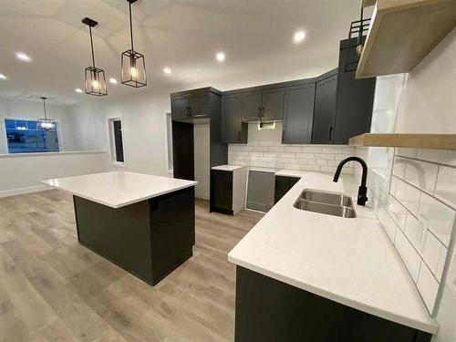 126 Prairie Gold Street, Taber, AB - Indoor Photo Showing Kitchen With Double Sink With Upgraded Kitchen