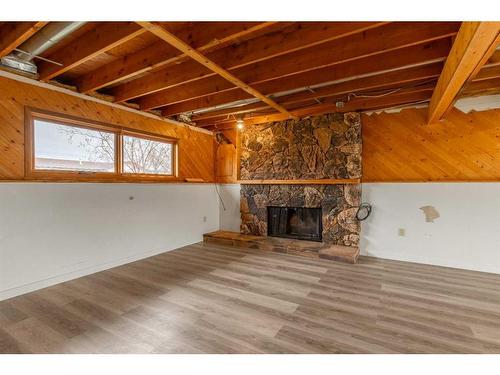 120 16 Street, Fort Macleod, AB - Indoor Photo Showing Other Room With Fireplace